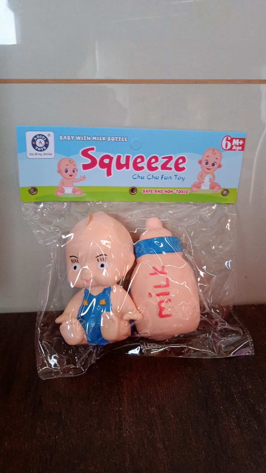 Baby And Bottle Squeeze Chu Chu Fun Toy (2 Pcs) - Bhavnagar Deodap